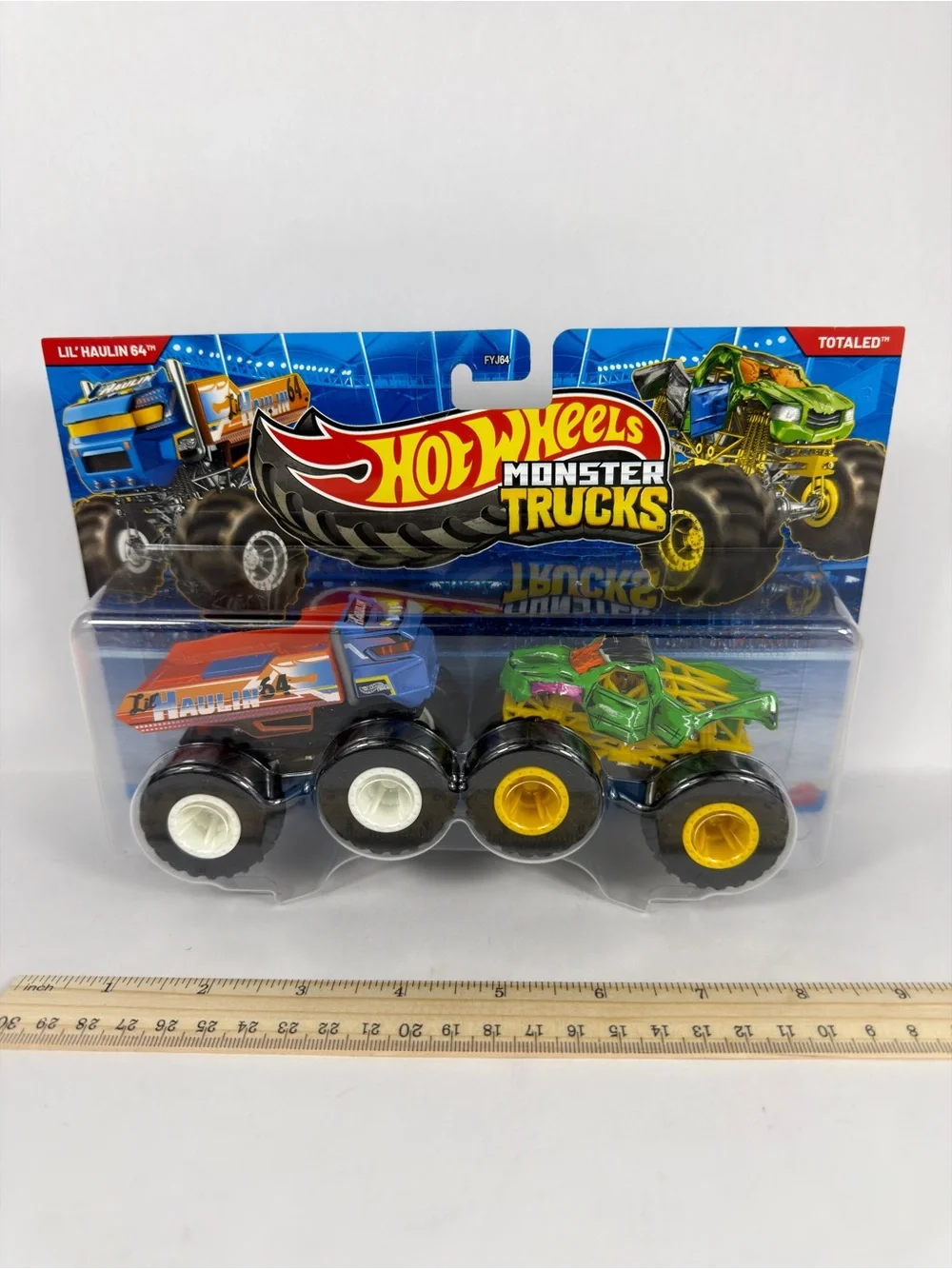 Hot Wheels Demolition Doubles Monster Trucks Lil’ Haulin 64 & Totaled